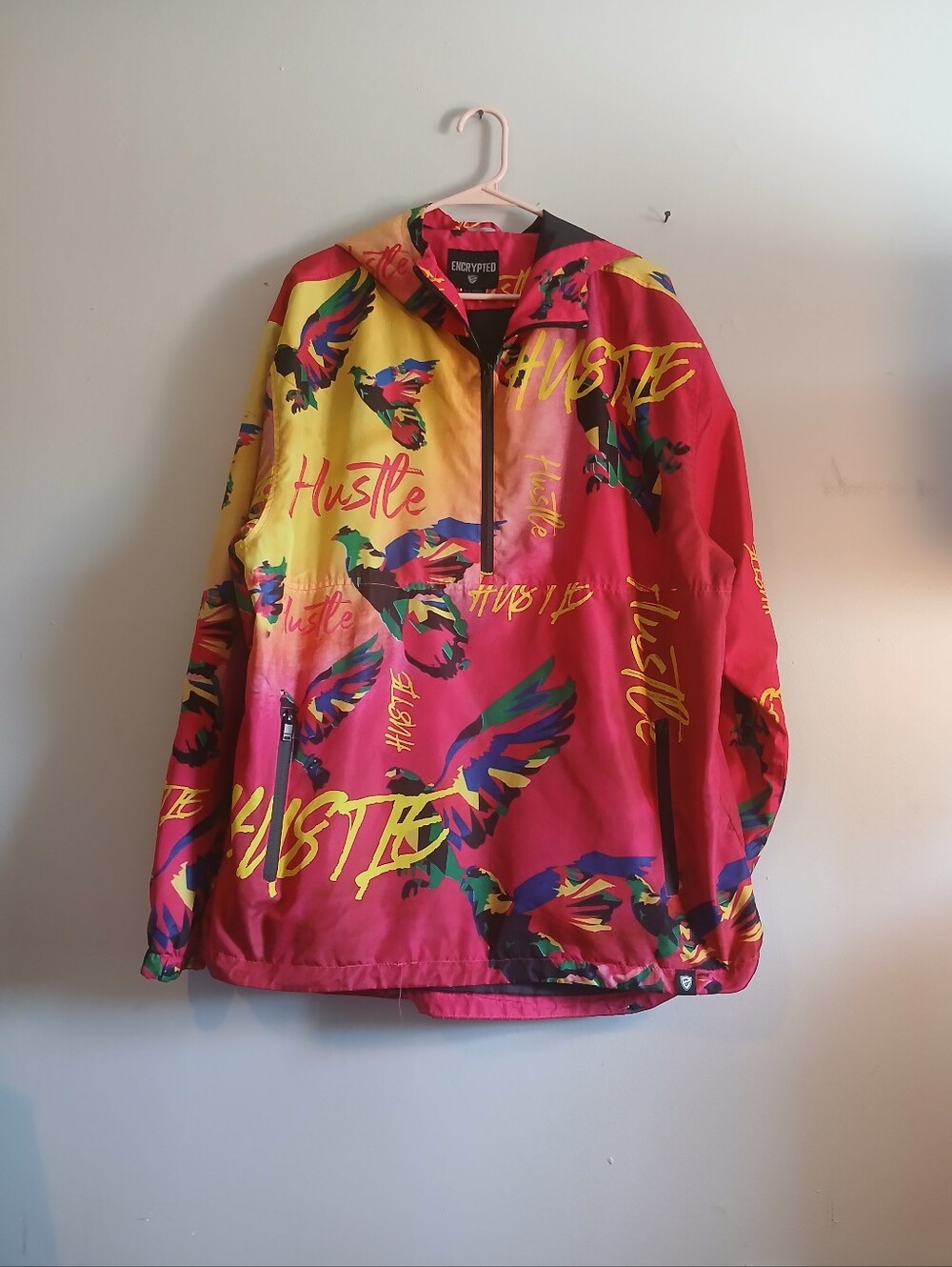 Encrypted Unisex Polyester 'Hustle' Red & Yellow Windbreaker Hoodie. Size X-LG